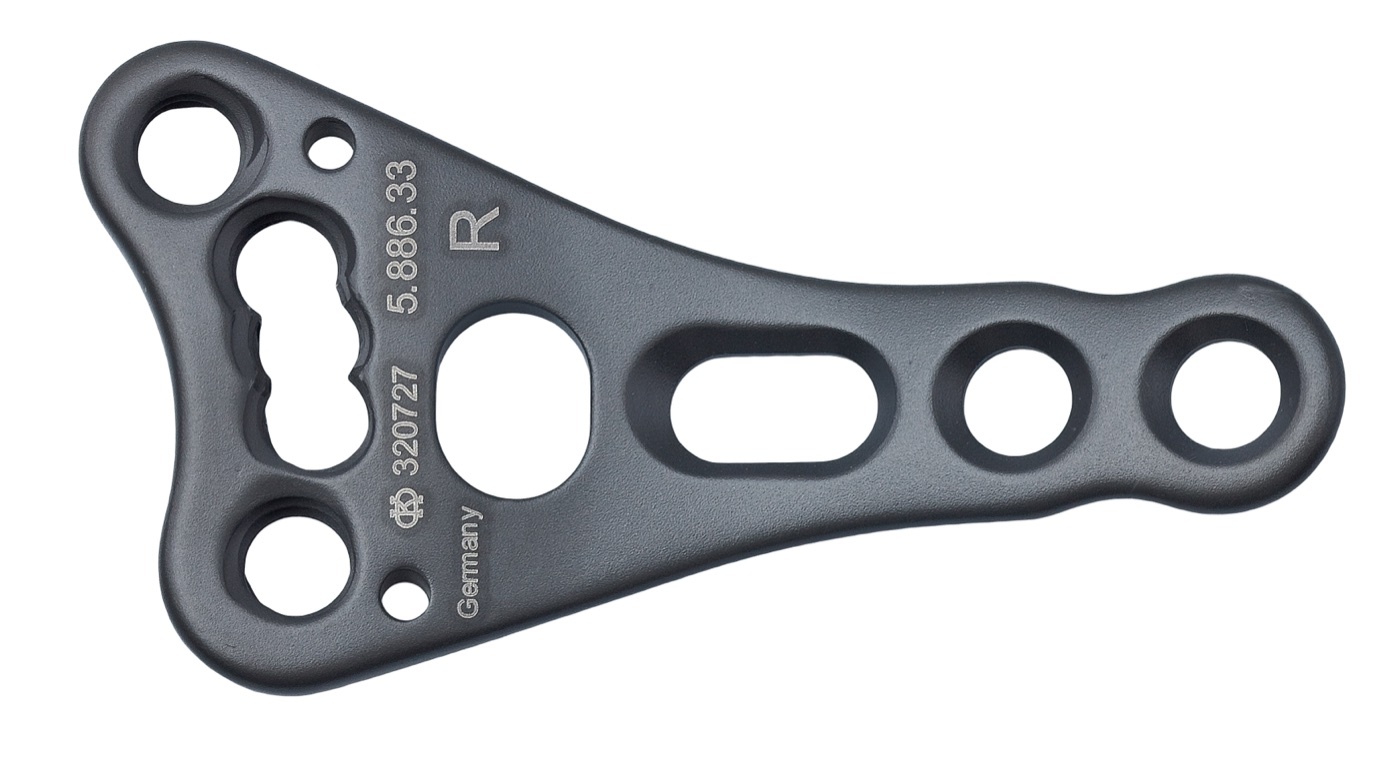Figure 7. A locking compression plate (LCP), whose combination holes accept either a conventional screw (compression) or a threaded locking head screw (angular stability). Source: Anne Sprechert, via Wikimedia Commons, CC BY-SA 4.0.
